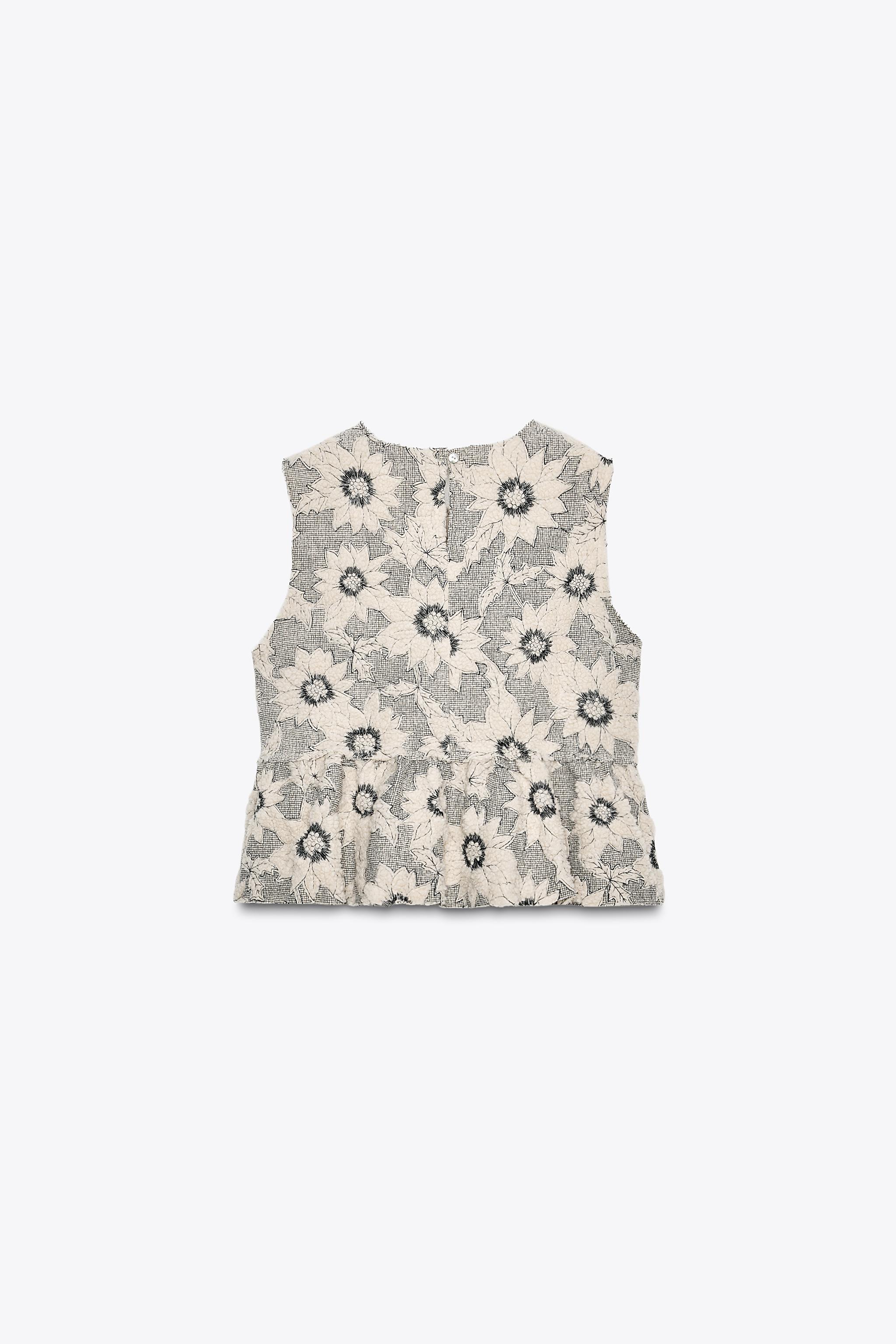 TOP PÉPLUM TEXTURÉ FLEURS